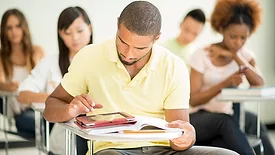 man studying in class