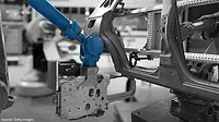 Factory robot arm in automobile manufacturing smart factory.