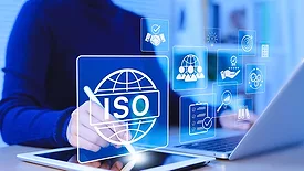 Iso Certification And Quality Management Concept Businesswoman Uses Tablet And Laptop