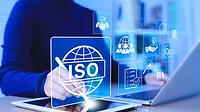 Iso Certification And Quality Management Concept Businesswoman Uses Tablet And Laptop Iso Certification And Quality Management Concept Businesswoman Uses Tablet And Laptop