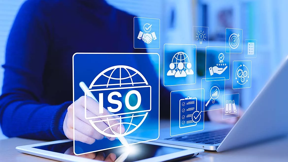 Iso Certification And Quality Management Concept Businesswoman Uses Tablet And Laptop