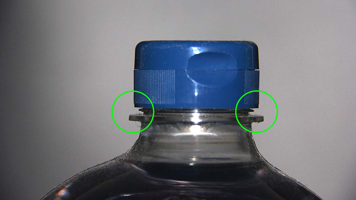 Bottle cap and flange spacing