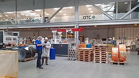Two Individuals Using Quality Management Software