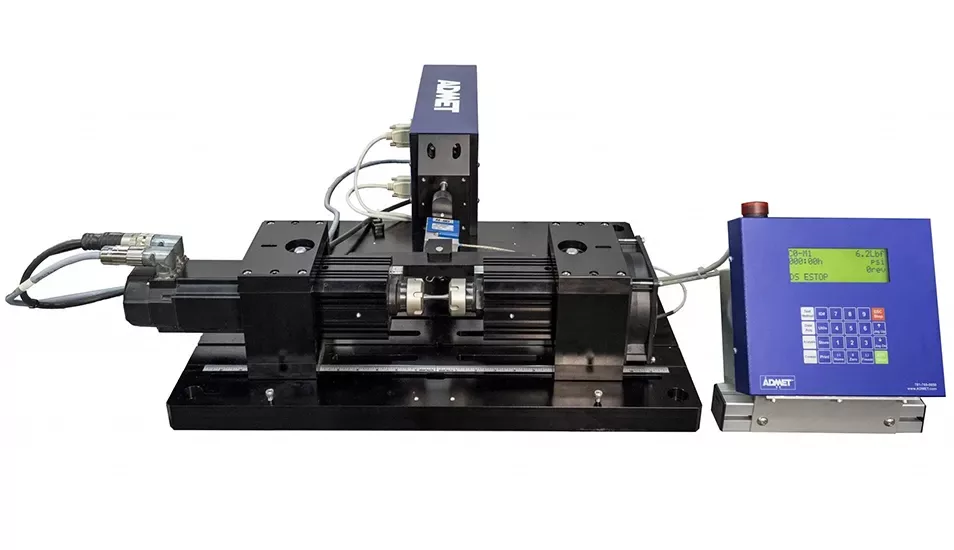 Rotating beam fatigue testing system with a motorized test fixture, specimen holder, and digital controller used for material fatigue and durability testing.