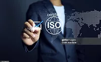 Business professional selecting an ISO certification icon on a digital interface, representing quality management standards, compliance, and international certification programs.