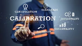 Technician selecting a digital calibration interface displaying metrology concepts, including calibration, certification, standards, measurement uncertainty, instrumentation, and evaluation.