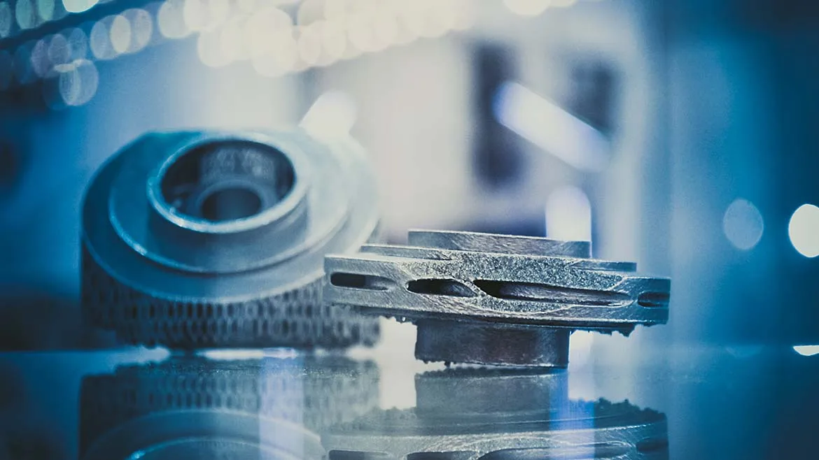 Metal Additive Manufacturing Component Metal additively manufactured component on a reflective surface.