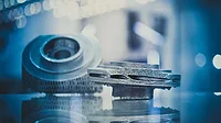 Metal Additive Manufacturing Component Metal additively manufactured component on a reflective surface.