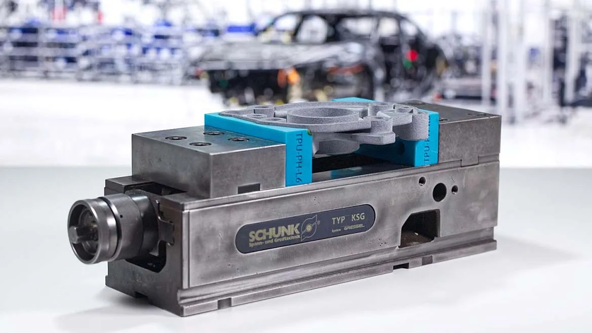 Custom clamping fixture securing a manufactured part for inspection.