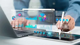 Business analytics dashboard displaying AI-driven charts and performance metrics across digital devices.
