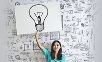QM 1223 Minitab InfoCenter Regression Analysis. Woman holding up drawing of lightbulb.