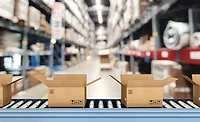 Cardboard boxes on conveyor rollers inside a warehouse Cardboard boxes on conveyor rollers inside a warehouse ready to be shipped by courier for distribution.