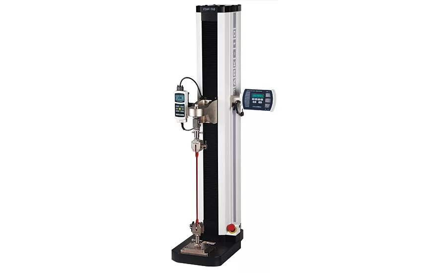 A 6.7 kN tensile tester is shown configured for an elastomeric tensile test. 