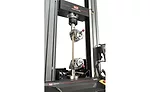 Figure 5: Testing seatbelt materials using capstan principle gripping solution. Source: Instron