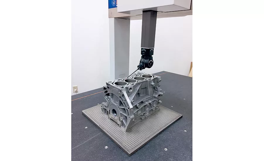 The Revolution LM armed with a REVO-2 probe scans an automotive part.