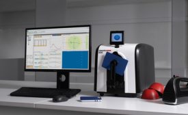 A Datacolor 800 spectrophotometer sits alongside the Datacolor TOOLS software for quality control. 