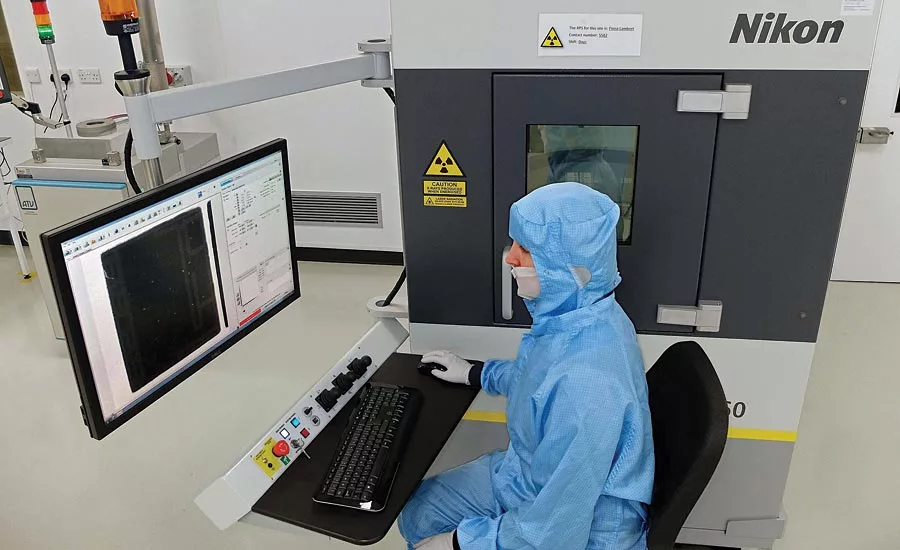 Fiona Lambert operating the Nikon Metrology XT V 160 X-ray inspection system.