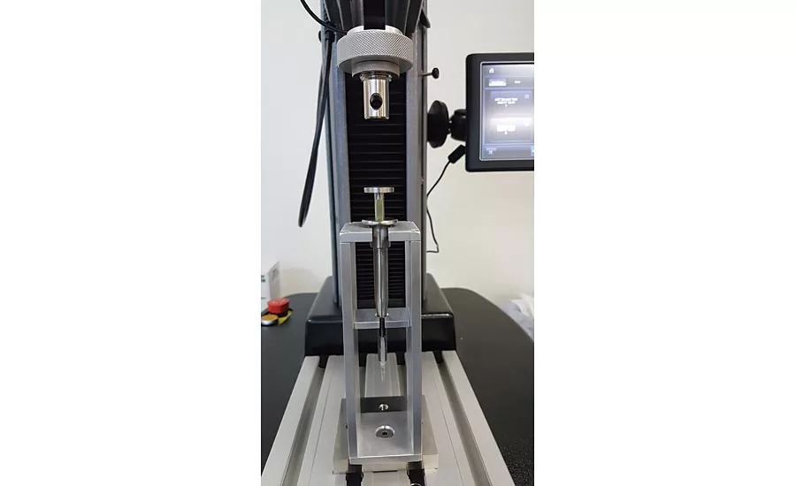 Custom syringe holder based on a T-Slot table.