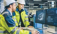 two engineers in hard hats
