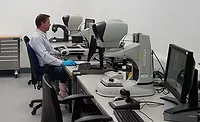 man in a quality control lab man in a quality control lab