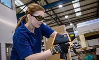 woman doing materials analysis woman doing materials analysis