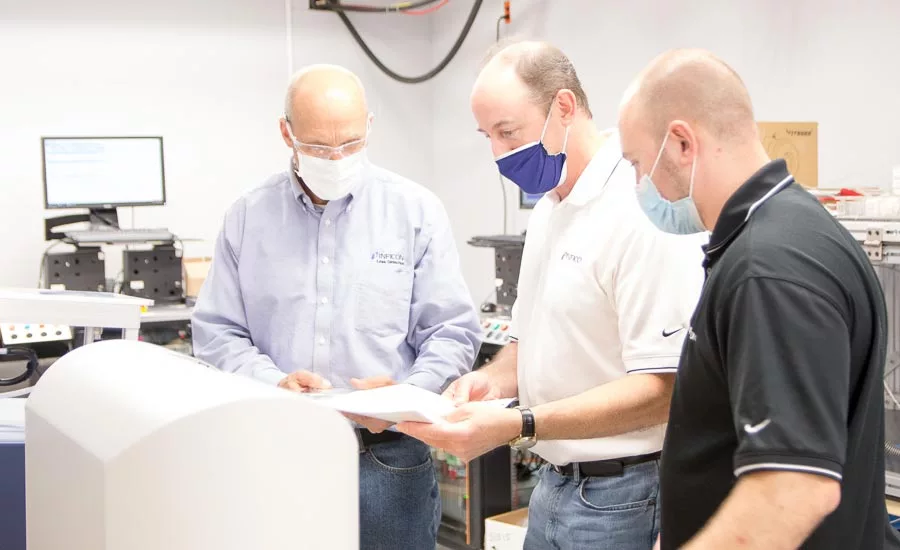 Installation of Lead-Detection Test Equipment. Source: INFICON