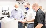 Installation of Lead-Detection Test Equipment. Source: INFICON
