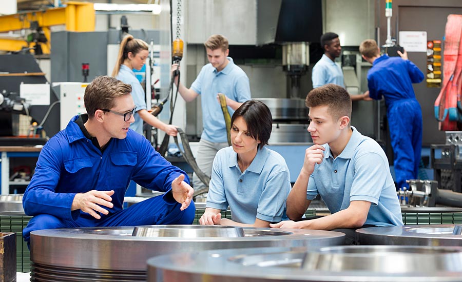 Quality Magazine: Training that meets the needs of today's manufacturers. Image of people being trained.