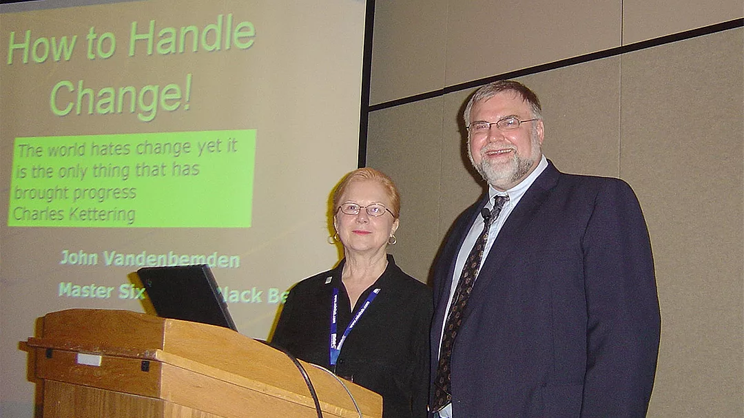 01 QM 0422 Professional of the Year John Vandenbemden Presenter WCQI Orlando FL with Molly Brown as session manager