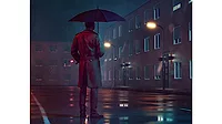 NDT April 2024 Ethics feature image of man with umbrella standing in the rain Man with umbrella and coat stands outside while it rains at night looking at a building.