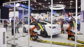 Automate event featuring automation demonstration using white vehicle.
