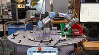 New Scale Robotics New Scale Robotics: an automated gaging system used to measure a small tray of surgical drills.
