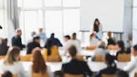 Business presentation background. Defocused image of people attending a lecture.
