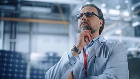Lean with Lazarus column feature image: Portrait of Male Engineer Focused Thinking