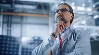 Lean with Lazarus column feature image: Portrait of Male Engineer Focused Thinking