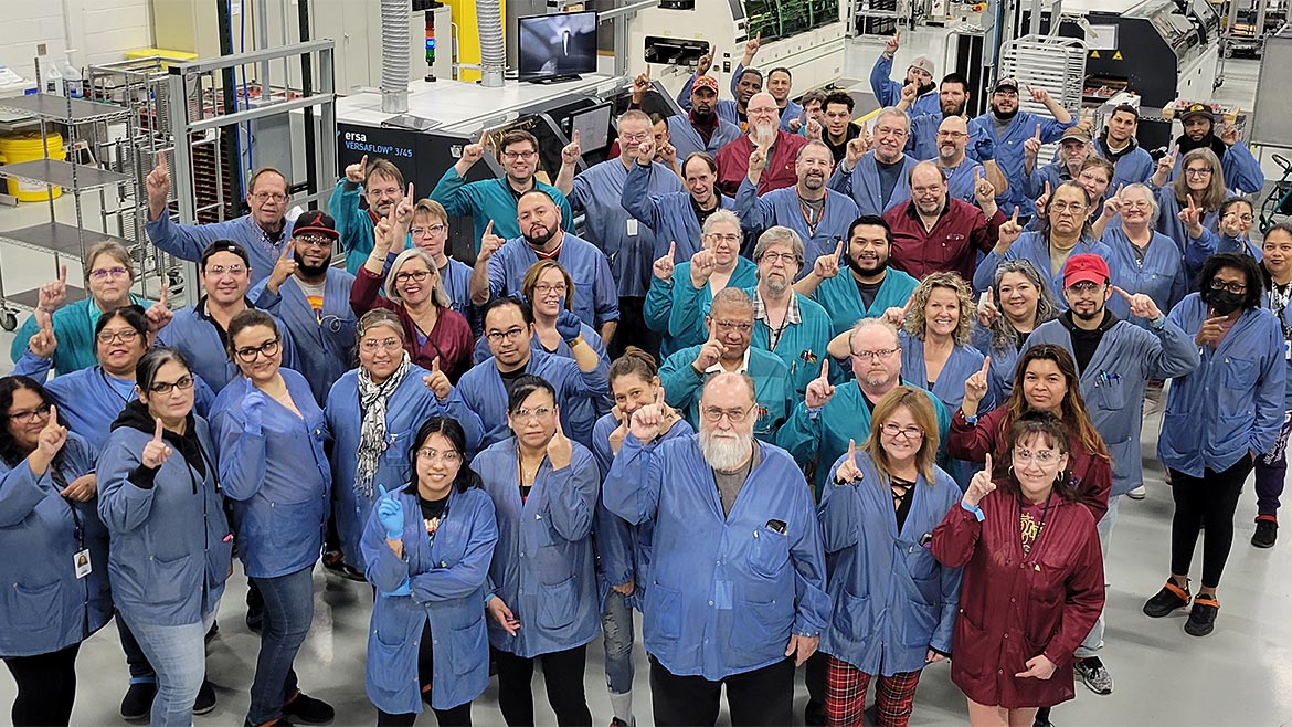Quality Leadership Survey: Tecnova Electronics employees posing for picture
