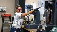 Management Feature Quality Leadership Survey Pinson Valley Heat Treating Quality Leadership rankings. At number 5, Pinson Valley Heat Treating. Female employee Rockwell testing.