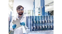NDT Leak Testing: The man holding the pouch cell