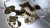 QM 0124 From the Editor feature image of closeup of mechanical puzzle.