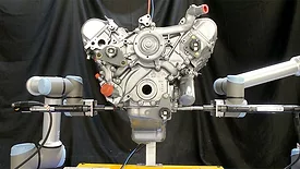 Machine Vision 101 feature. a pair of UR10e and UR16e cobots from Universal Robots perform assembly tasks on an engine that’s in motion –no machine vision required.
