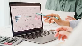 QM 0124 Quality 101 Part 2 Data Analytics. Closeup group of business people meeting discuss project plan and financial results in office.