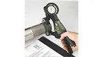 Hand holding a pressure gauge