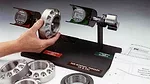 Hand holding a Int 2.375 Inch