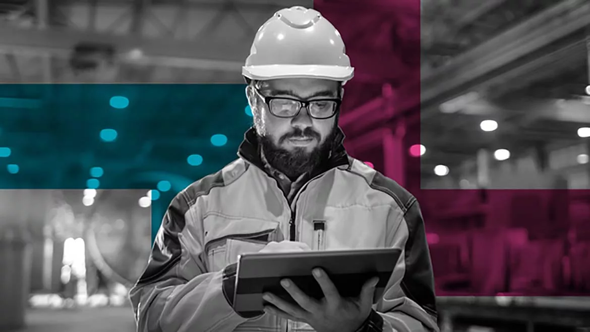 Black and white image of male in hard hat working on a tablet, a blue strip and a pink strip background partial overlay.