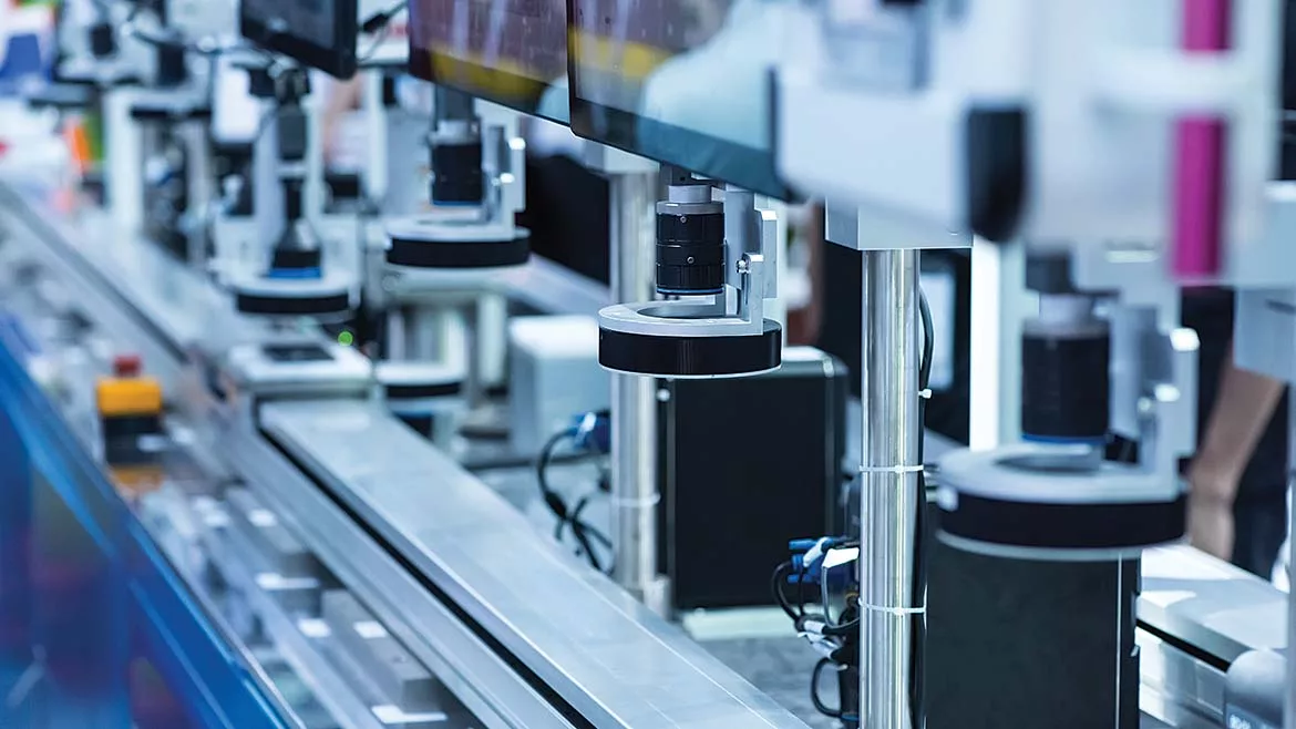 Robotic machine vision system in phone factory.