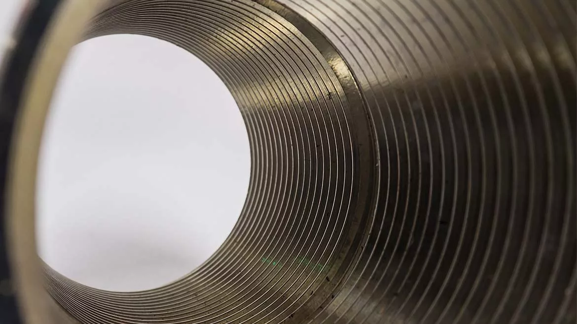 Close-up of circle tube with spiral inside, tunnel of spiral