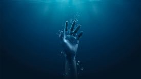 Drowning hand underwater
