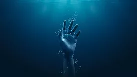 Drowning hand underwater
