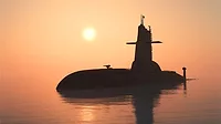 Surfaced submarine in the water at sunset