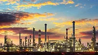 Oil refinery industrial plant at night